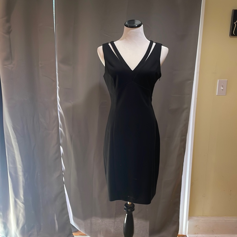 Knee length black cocktail dress